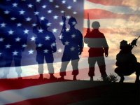 Flag with soldiers in foreground